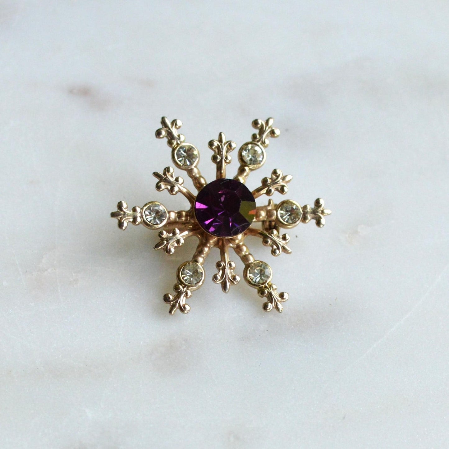 Vintage 1950s Atomic Star Snowflake Brooch, Amethyst Purple Rhinestone Pin 1.15"