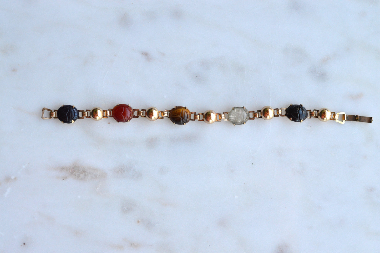 Vintage 14K Gold‑filled Scarab Bal-Ron Bracelet featuring Carved Multi‑Stone Scarabs in Classic Egyptian Revival Style