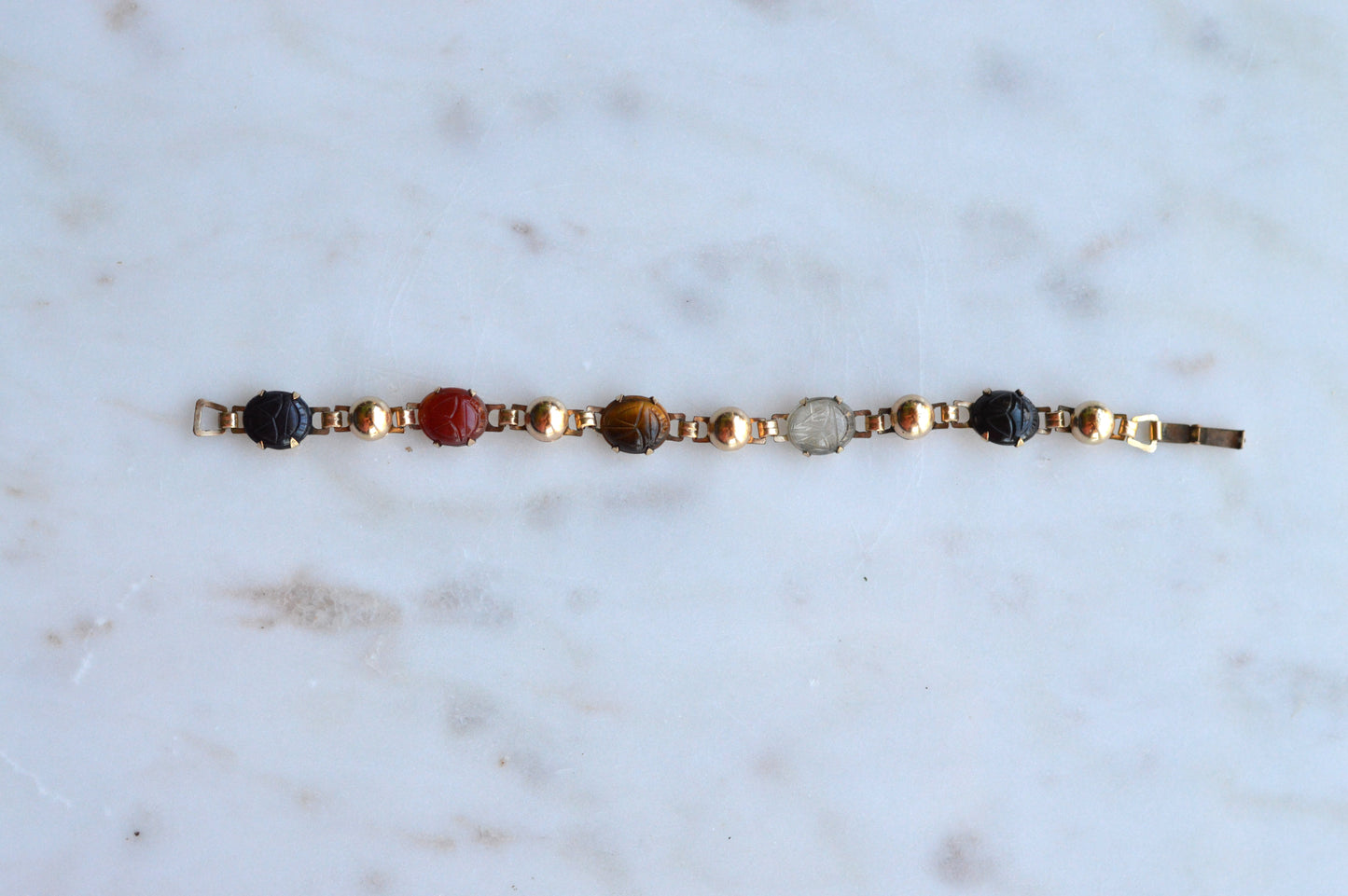 Vintage 14K Gold‑filled Scarab Bal-Ron Bracelet featuring Carved Multi‑Stone Scarabs in Classic Egyptian Revival Style