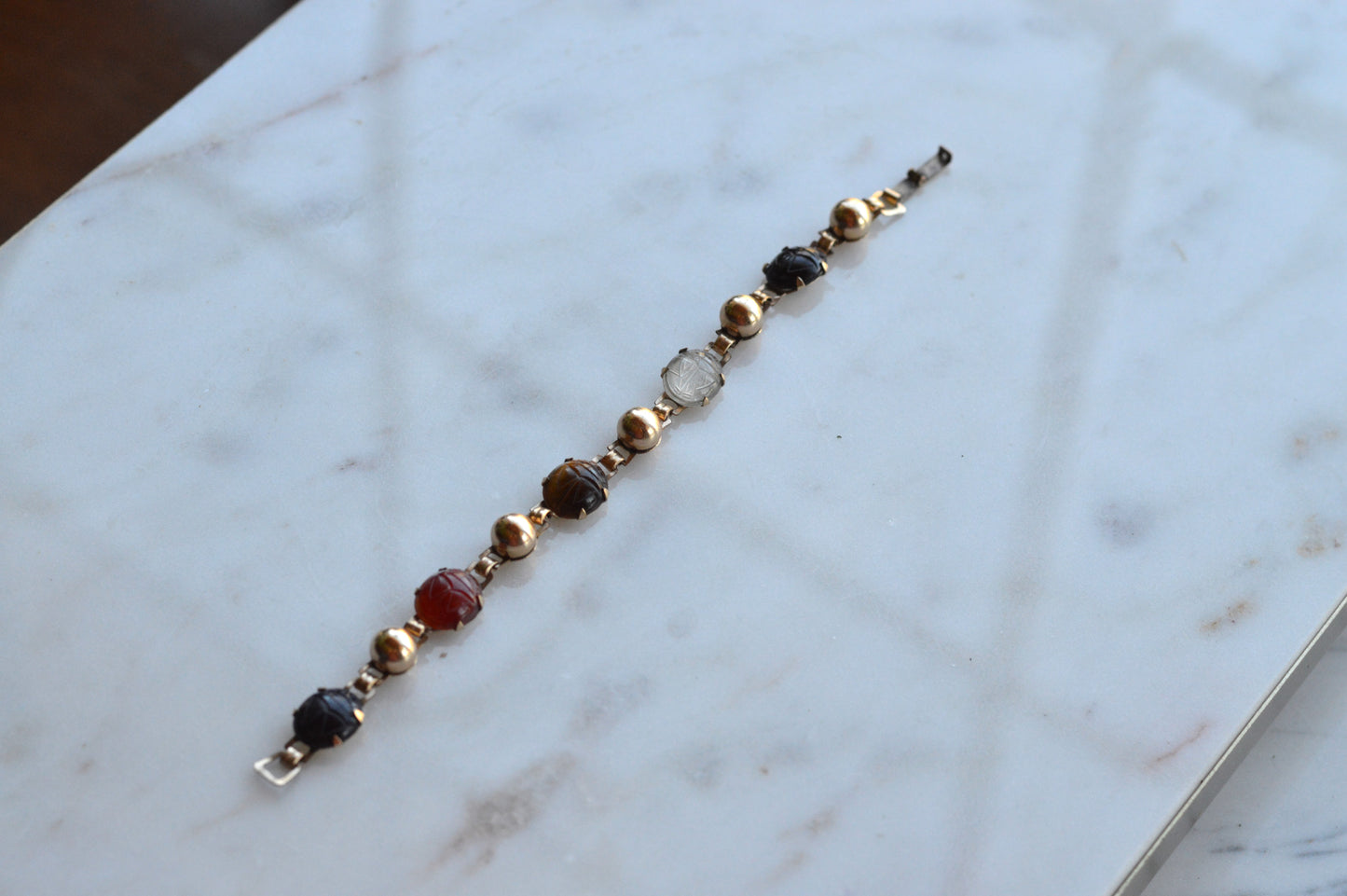 Vintage 14K Gold‑filled Scarab Bal-Ron Bracelet featuring Carved Multi‑Stone Scarabs in Classic Egyptian Revival Style