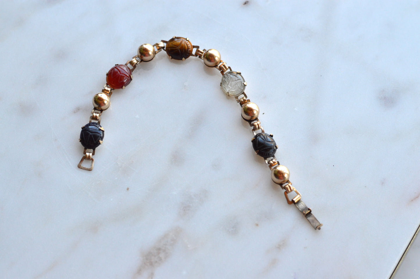 Vintage 14K Gold‑filled Scarab Bal-Ron Bracelet featuring Carved Multi‑Stone Scarabs in Classic Egyptian Revival Style