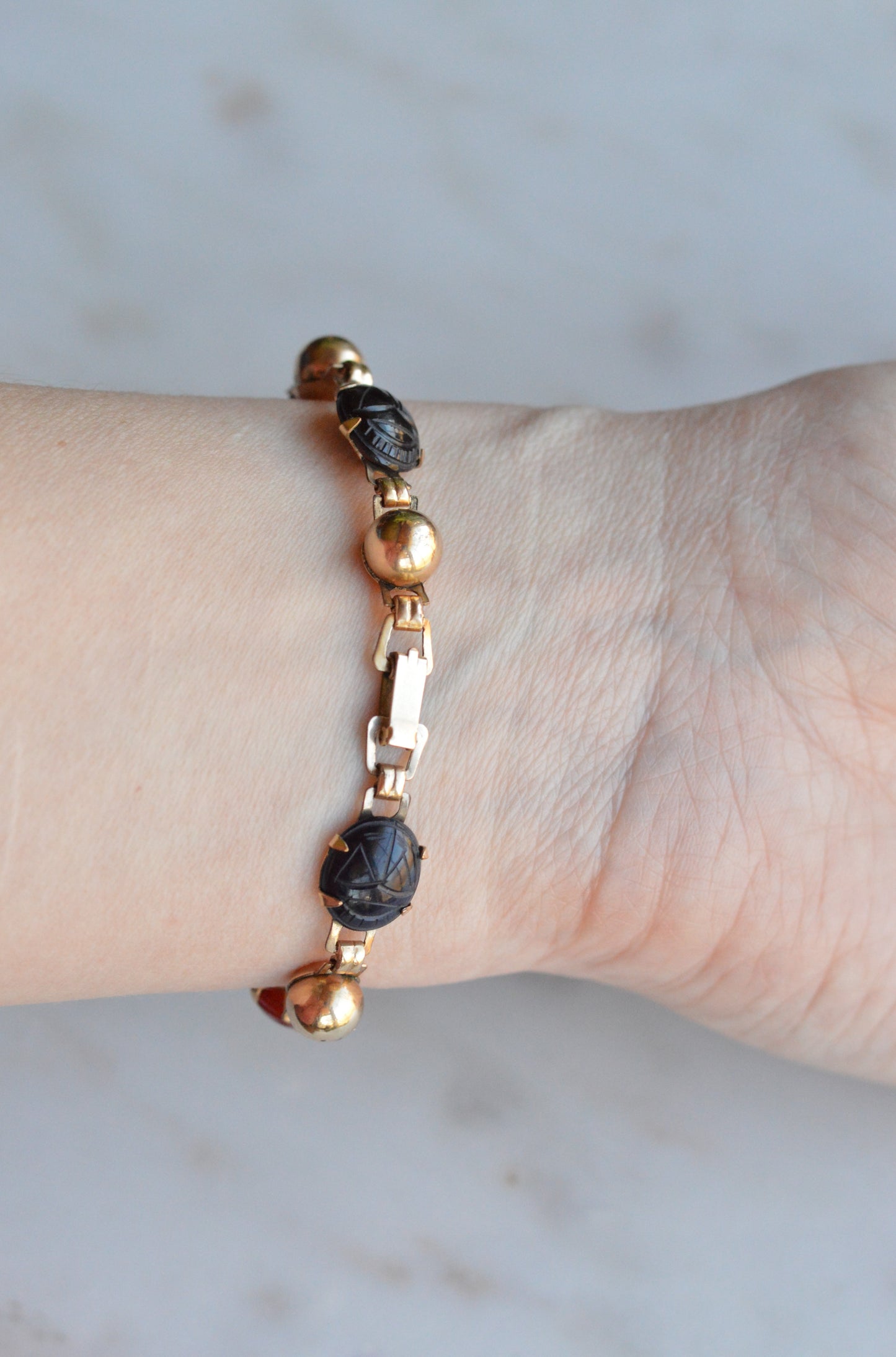 Vintage 14K Gold‑filled Scarab Bal-Ron Bracelet featuring Carved Multi‑Stone Scarabs in Classic Egyptian Revival Style