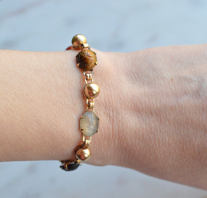Vintage 14K Gold‑filled Scarab Bal-Ron Bracelet featuring Carved Multi‑Stone Scarabs in Classic Egyptian Revival Style
