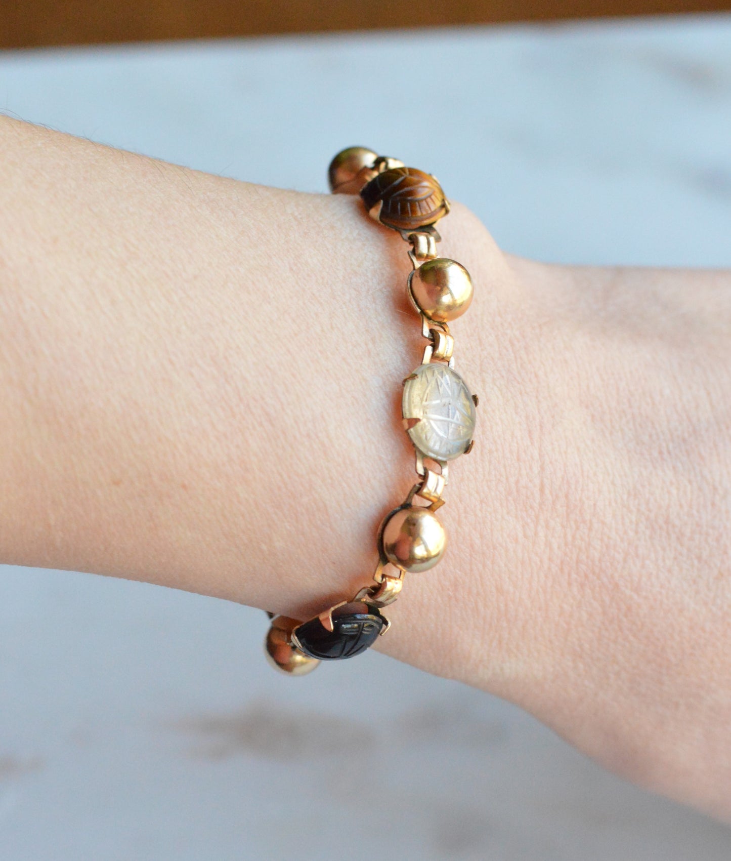Vintage 14K Gold‑filled Scarab Bal-Ron Bracelet featuring Carved Multi‑Stone Scarabs in Classic Egyptian Revival Style