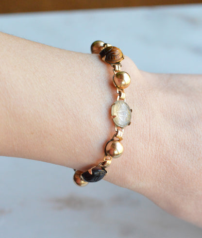 Vintage 14K Gold‑filled Scarab Bal-Ron Bracelet featuring Carved Multi‑Stone Scarabs in Classic Egyptian Revival Style