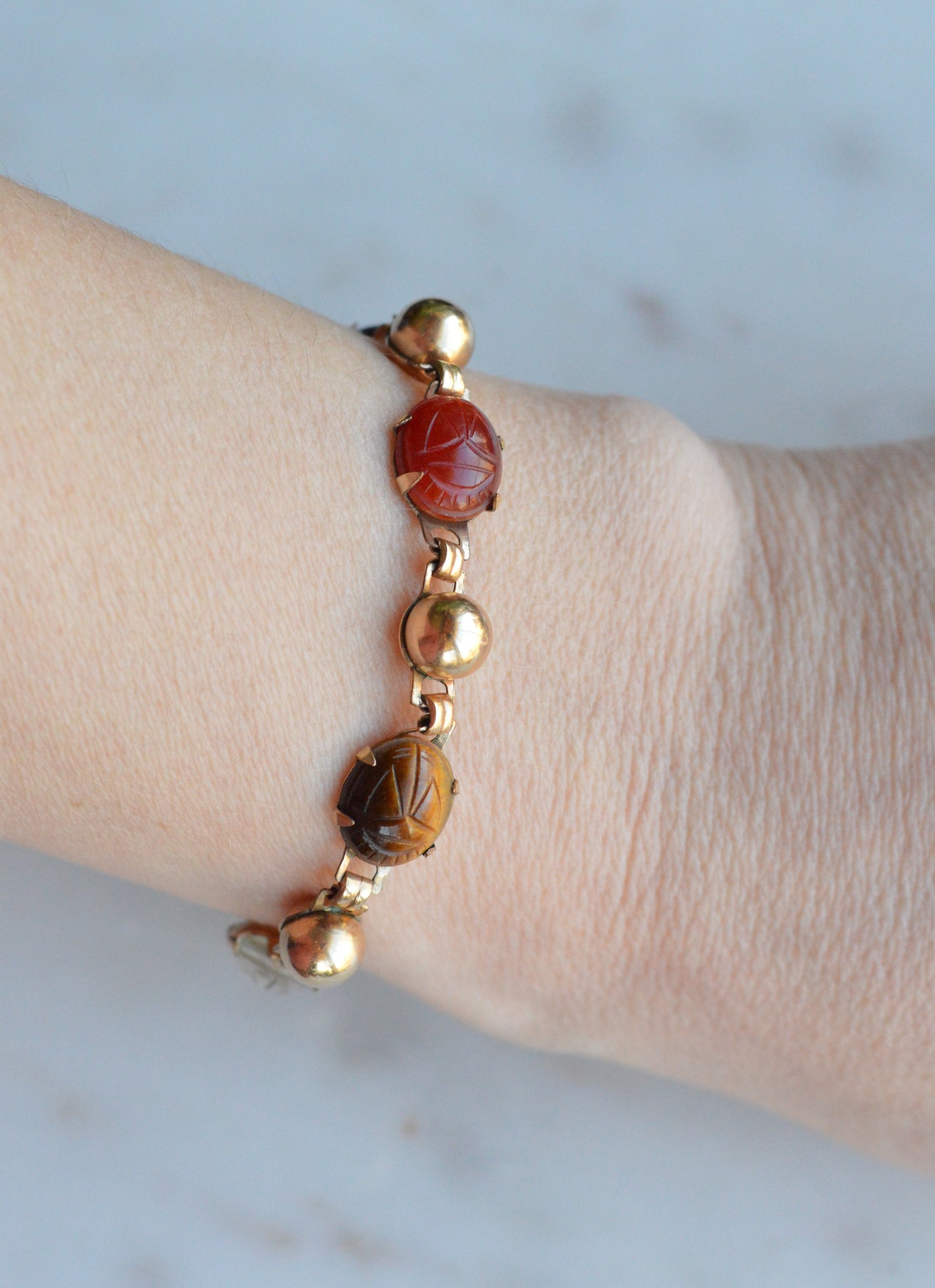 Vintage 14K Gold‑filled Scarab Bal-Ron Bracelet featuring Carved Multi‑Stone Scarabs in Classic Egyptian Revival Style