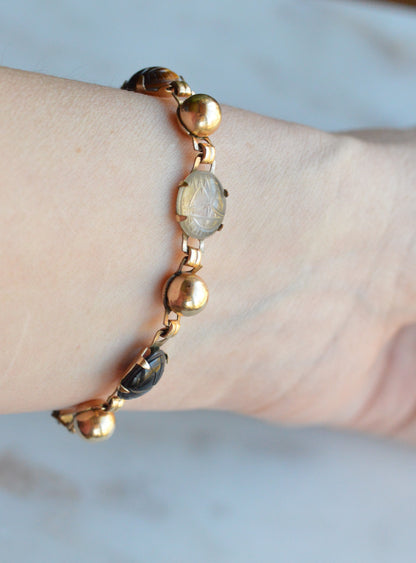 Vintage 14K Gold‑filled Scarab Bal-Ron Bracelet featuring Carved Multi‑Stone Scarabs in Classic Egyptian Revival Style