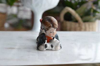 Vintage Hand-Painted Occupied Japan Porcelain Figurine - Little Boy Lying Down with Terrier Puppy Dog, c. 1945-1952