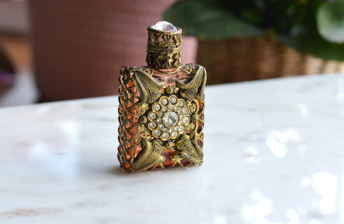 Vintage Jeweled Brass Filigree Perfume Bottle – Amber Glass, Clear Rhinestone Floral Medallion, Crystal Prism Stopper