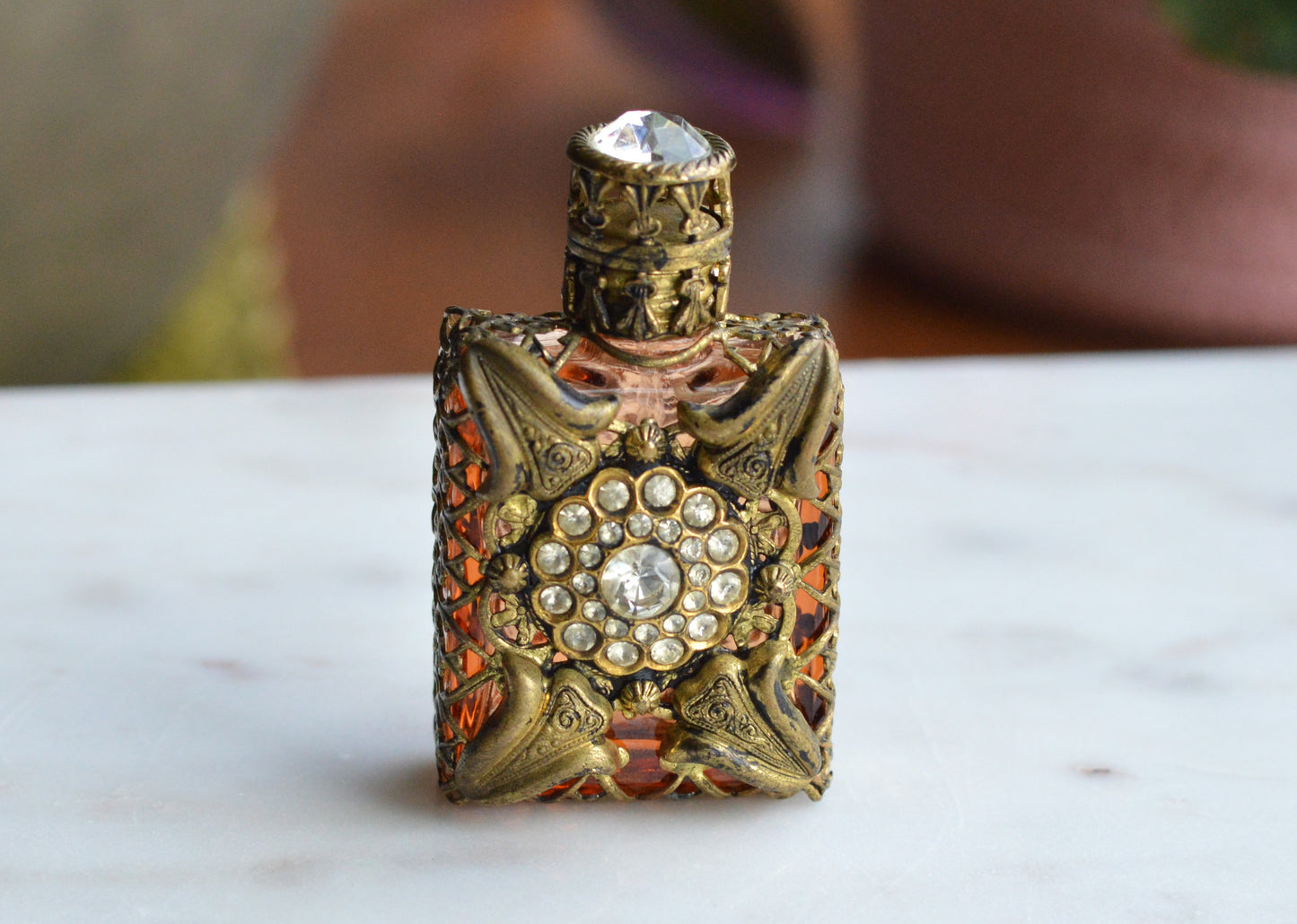 Vintage Jeweled Brass Filigree Perfume Bottle – Amber Glass, Clear Rhinestone Floral Medallion, Crystal Prism Stopper