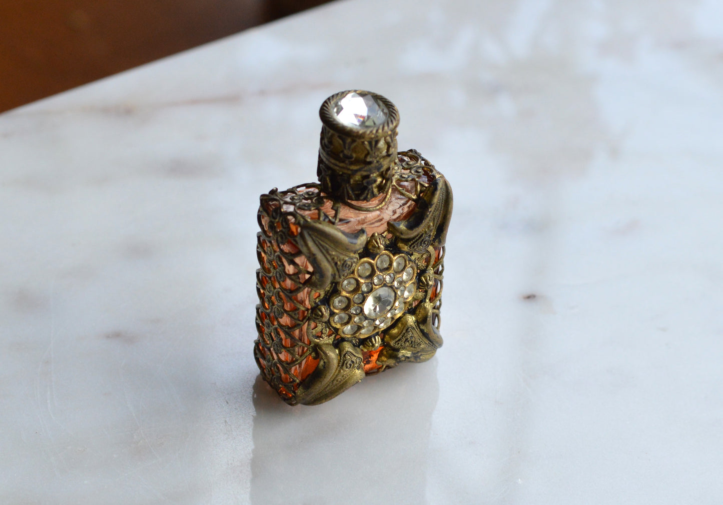 Vintage Jeweled Brass Filigree Perfume Bottle – Amber Glass, Clear Rhinestone Floral Medallion, Crystal Prism Stopper