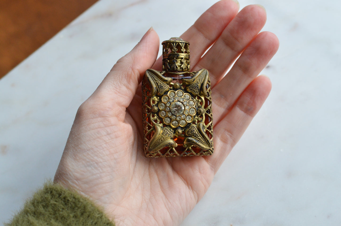 Vintage Jeweled Brass Filigree Perfume Bottle – Amber Glass, Clear Rhinestone Floral Medallion, Crystal Prism Stopper