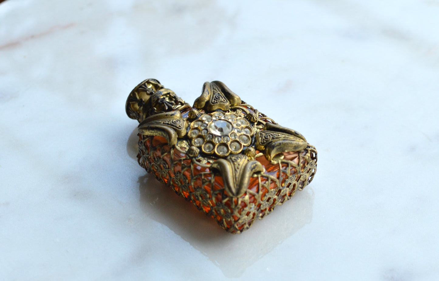 Vintage Jeweled Brass Filigree Perfume Bottle – Amber Glass, Clear Rhinestone Floral Medallion, Crystal Prism Stopper