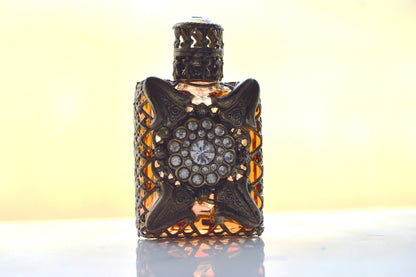 Vintage Jeweled Brass Filigree Perfume Bottle – Amber Glass, Clear Rhinestone Floral Medallion, Crystal Prism Stopper