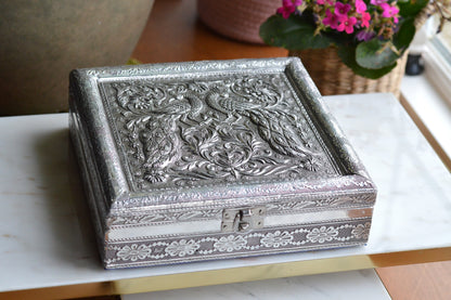 Vintage Indo-Persian Peacock Repoussé Jewelry Box – Ornate Hand-Chased Silver Tone Casket with Mirror & Blue Velvet Lining