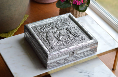 Vintage Indo-Persian Peacock Repoussé Jewelry Box – Ornate Hand-Chased Silver Tone Casket with Mirror & Blue Velvet Lining