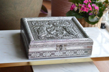 Vintage Indo-Persian Peacock Repoussé Jewelry Box – Ornate Hand-Chased Silver Tone Casket with Mirror & Blue Velvet Lining