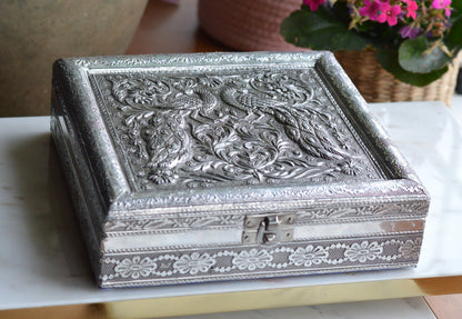 Vintage Indo-Persian Peacock Repoussé Jewelry Box – Ornate Hand-Chased Silver Tone Casket with Mirror & Blue Velvet Lining