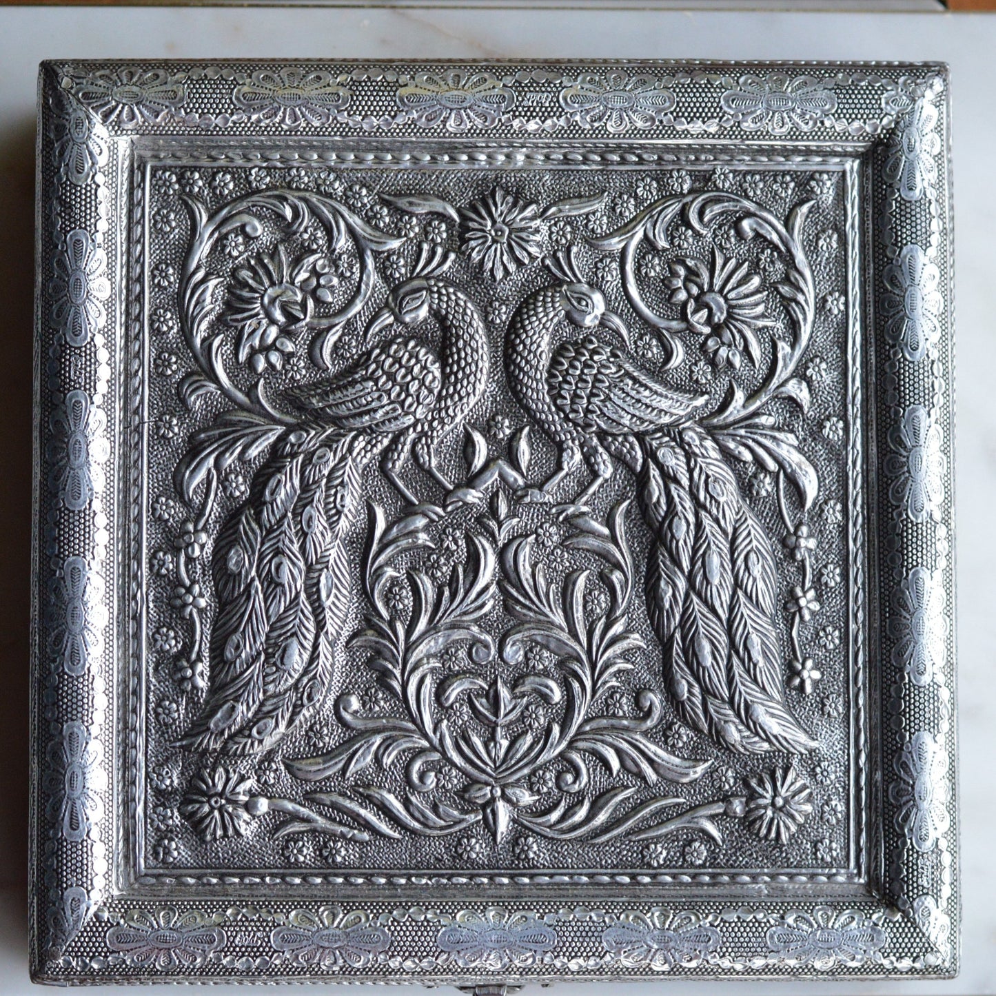 Vintage Indo-Persian Peacock Repoussé Jewelry Box – Ornate Hand-Chased Silver Tone Casket with Mirror & Blue Velvet Lining
