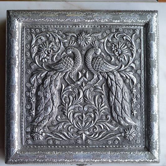 Vintage Indo-Persian Peacock Repoussé Jewelry Box – Ornate Hand-Chased Silver Tone Casket with Mirror & Blue Velvet Lining