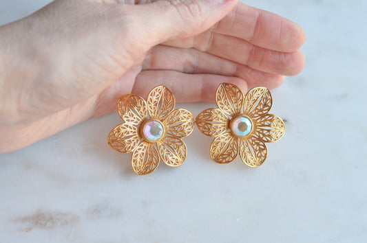 Vintage Avon Glistening Petal Filigree Flower Earrings, Aurora Borealis AB Rhinestone Centers, 1980s Gold Tone Floral Clip On Earrings