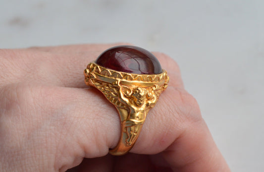 Rare Vintage Elizabeth Taylor for Avon "Gilded Age" Cherub Ring - 22K Gold Plated with Faux Ruby Cabochon - 1994 Collection Size 7