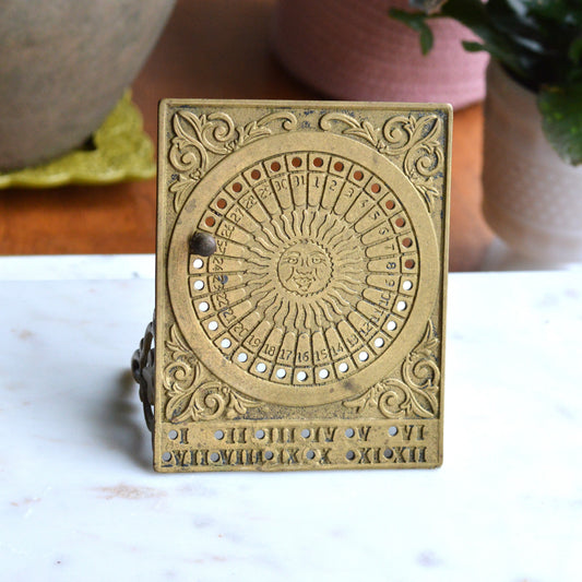 Vintage Brass Perpetual Sun Calendar | Ornate Desktop Date Tracker with Easel Stand | Celestial Astrology Home Decor | Mid-Century Brass Tabletop Accessory