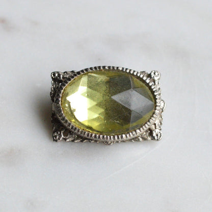 Vintage West Germany Style Brooch | 1.5" Faceted Peridot Green Glass | Ornate Silver Tone Filigree | Mid-Century Victorian Revival