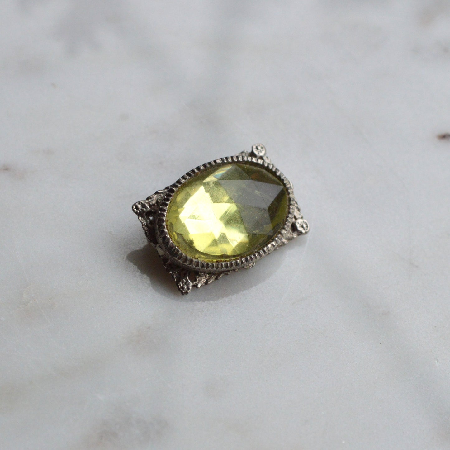 Vintage West Germany Style Brooch | 1.5" Faceted Peridot Green Glass | Ornate Silver Tone Filigree | Mid-Century Victorian Revival