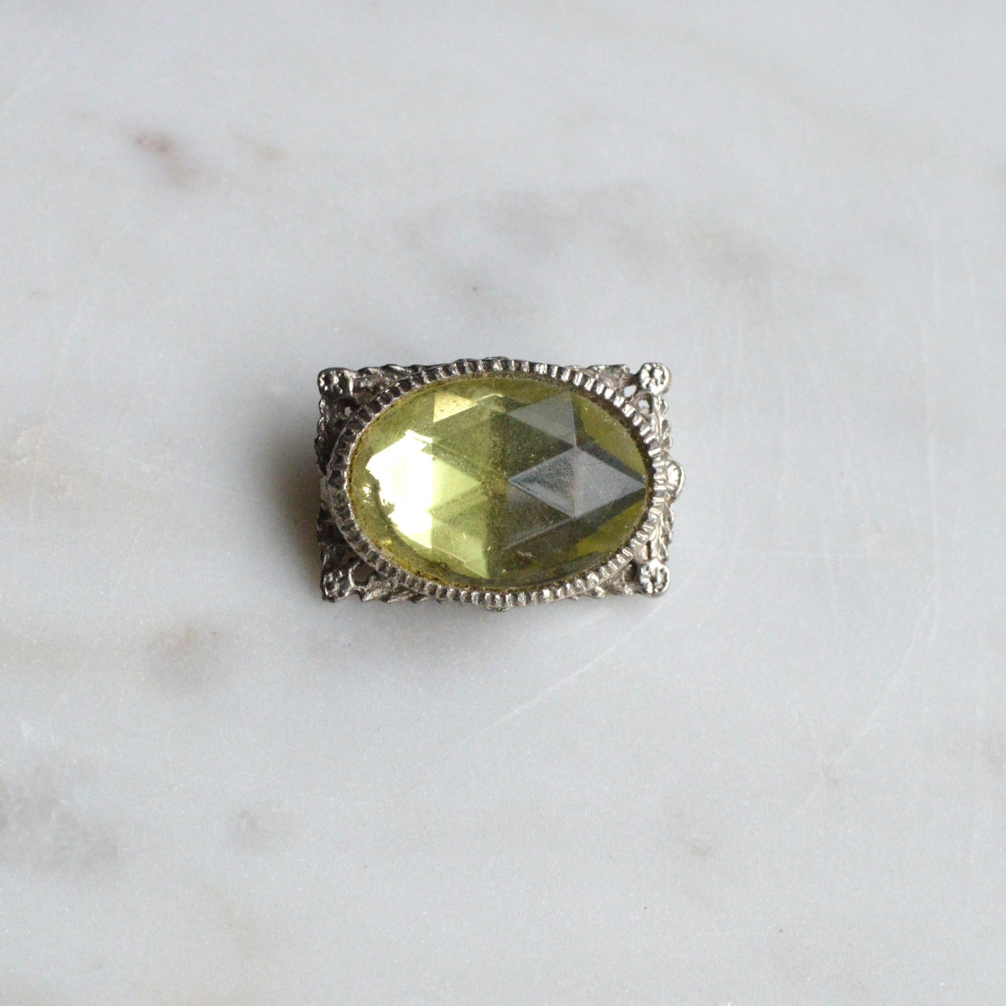 Vintage West Germany Style Brooch | 1.5" Faceted Peridot Green Glass | Ornate Silver Tone Filigree | Mid-Century Victorian Revival