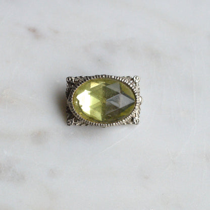 Vintage West Germany Style Brooch | 1.5" Faceted Peridot Green Glass | Ornate Silver Tone Filigree | Mid-Century Victorian Revival