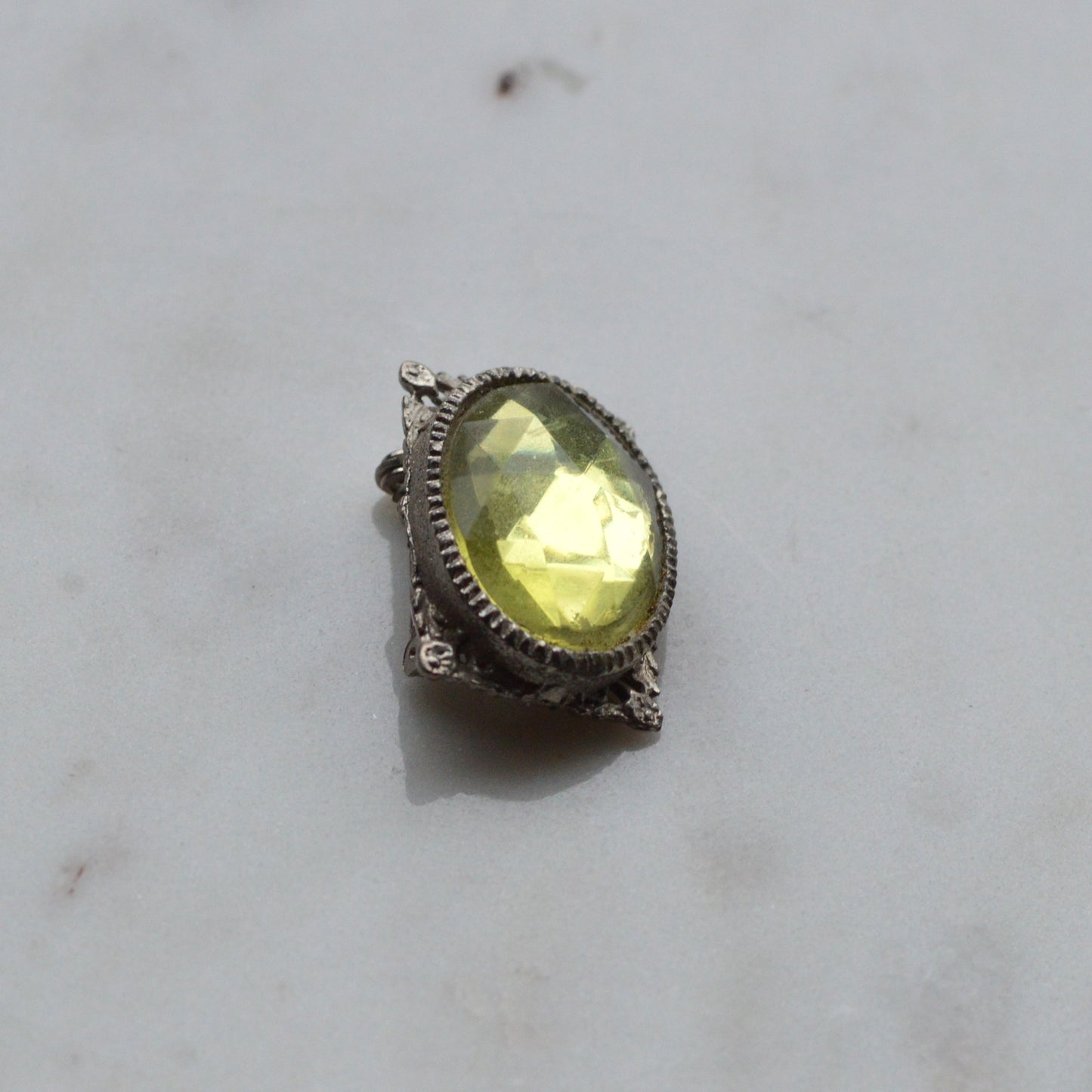 Vintage West Germany Style Brooch | 1.5" Faceted Peridot Green Glass | Ornate Silver Tone Filigree | Mid-Century Victorian Revival
