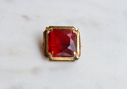 Antique Art Deco 1" Ruby Red Brooch | Large Emerald Cut Glass Stone | Ornate Open Back Gold Tone Statement Pin