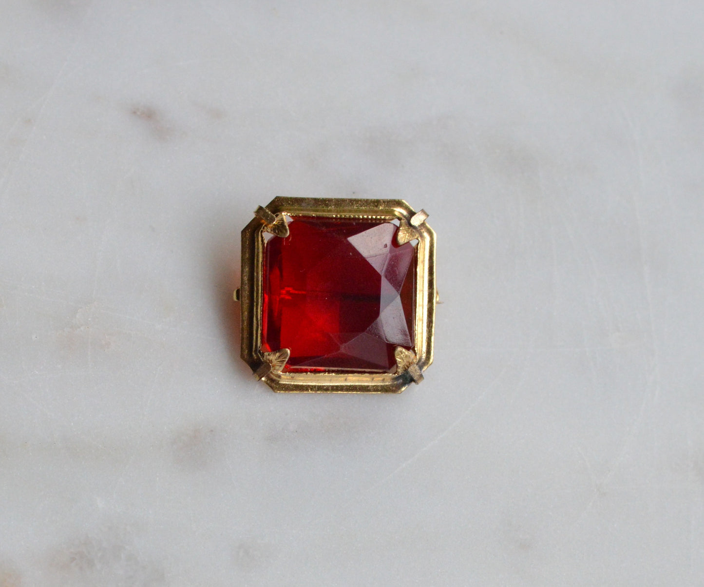 Antique Art Deco 1" Ruby Red Brooch | Large Emerald Cut Glass Stone | Ornate Open Back Gold Tone Statement Pin