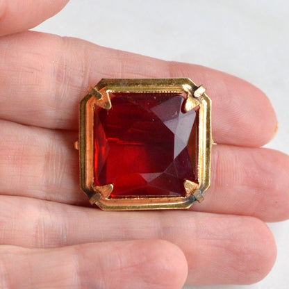 Antique Art Deco 1" Ruby Red Brooch | Large Emerald Cut Glass Stone | Ornate Open Back Gold Tone Statement Pin