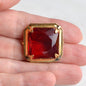 Antique Art Deco 1" Ruby Red Brooch | Large Emerald Cut Glass Stone | Ornate Open Back Gold Tone Statement Pin