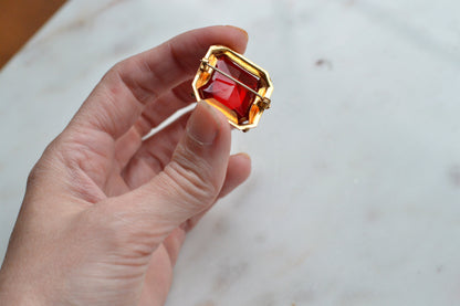 Antique Art Deco 1" Ruby Red Brooch | Large Emerald Cut Glass Stone | Ornate Open Back Gold Tone Statement Pin