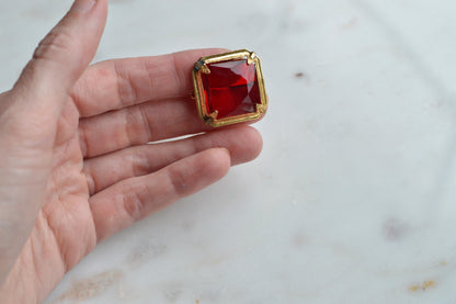 Antique Art Deco 1" Ruby Red Brooch | Large Emerald Cut Glass Stone | Ornate Open Back Gold Tone Statement Pin