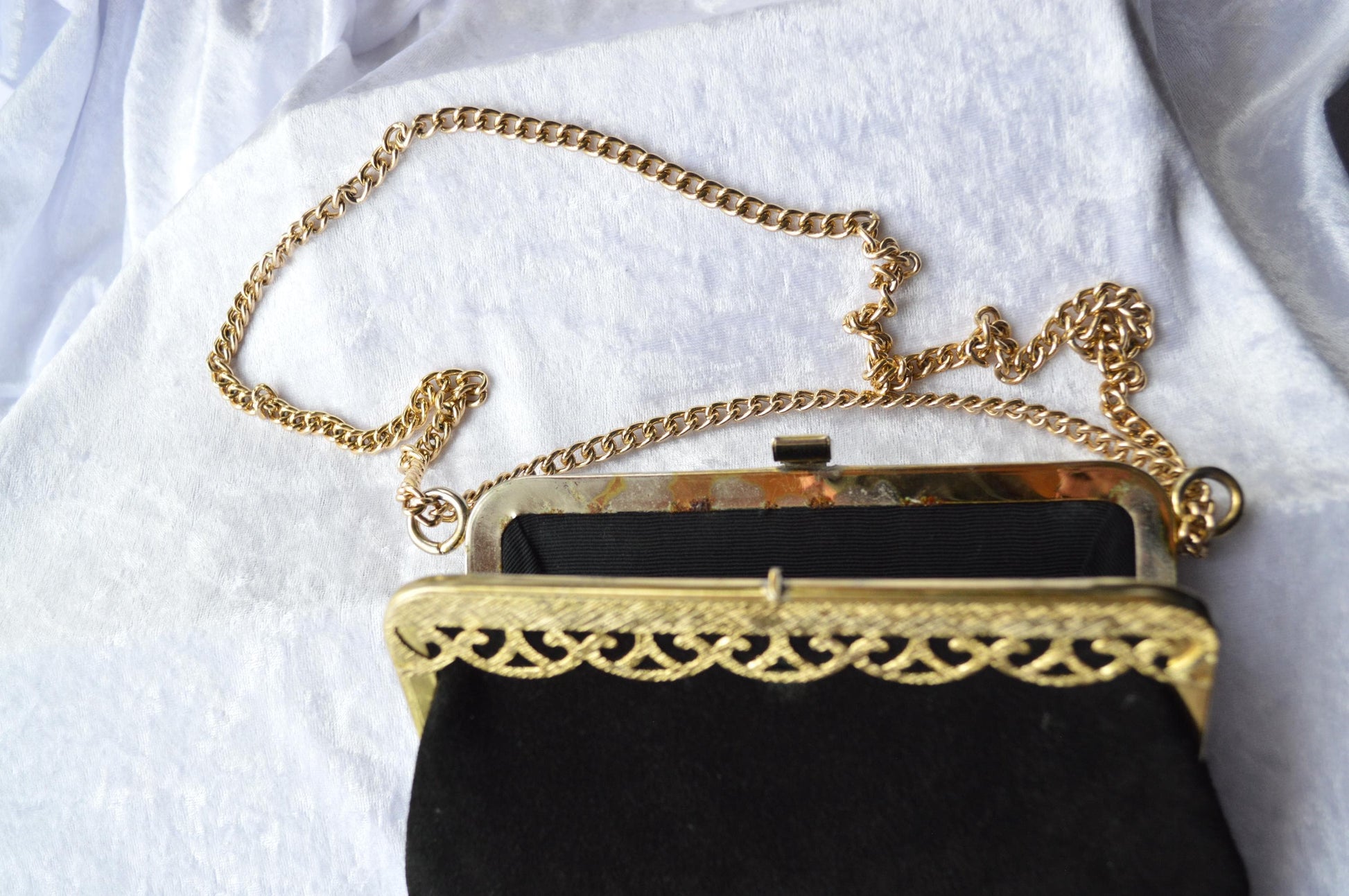 Vintage Black Suede Shoulder Bag with Gold Toned Chain and Trim